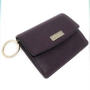 NWOT kate spade laurel way petty coin purse wallet. Color mahogany. Leather